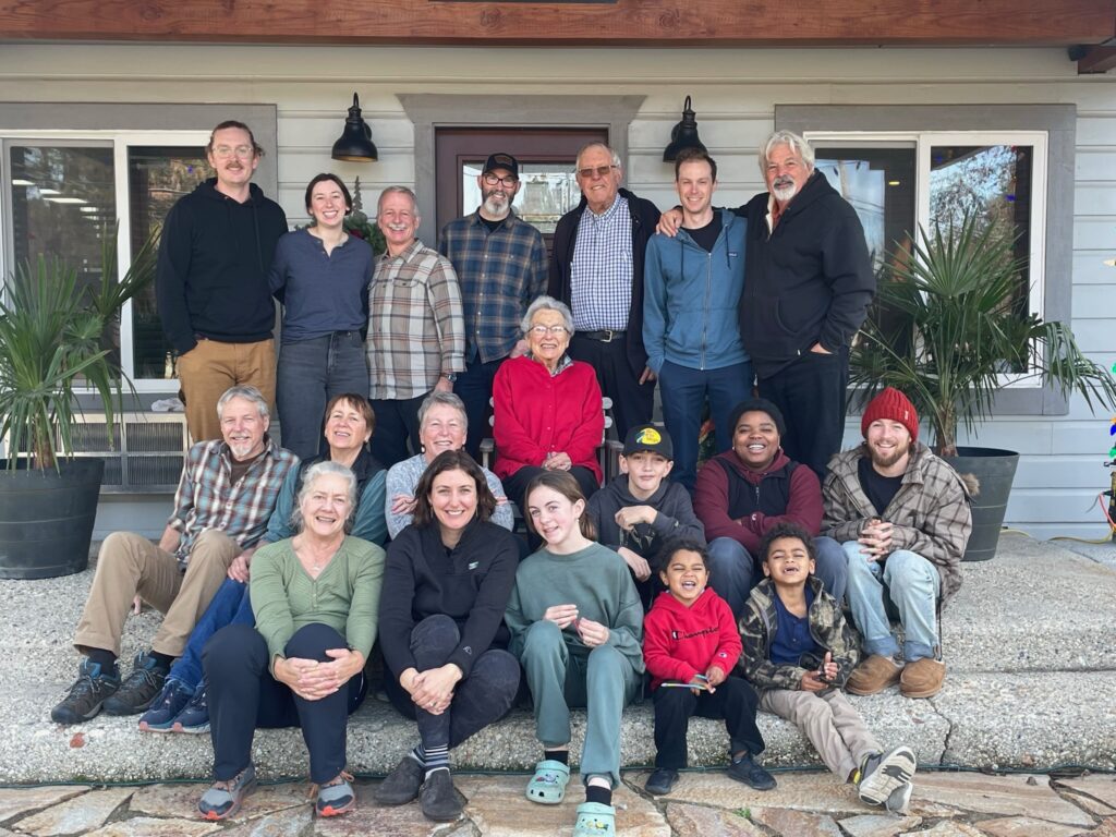 Family gathered on steps of Willow Springs Lodge