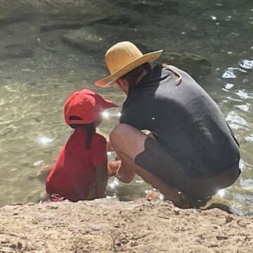 father and child by Yuba River