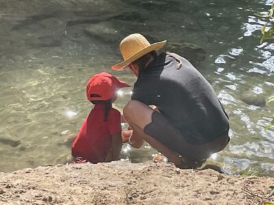 father and child by Yuba River