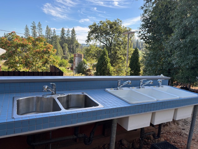 a 5-sink dishwashing station with amazing view